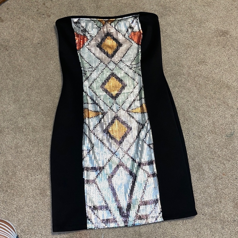 Size medium tight mini dress with sequence detail down the front